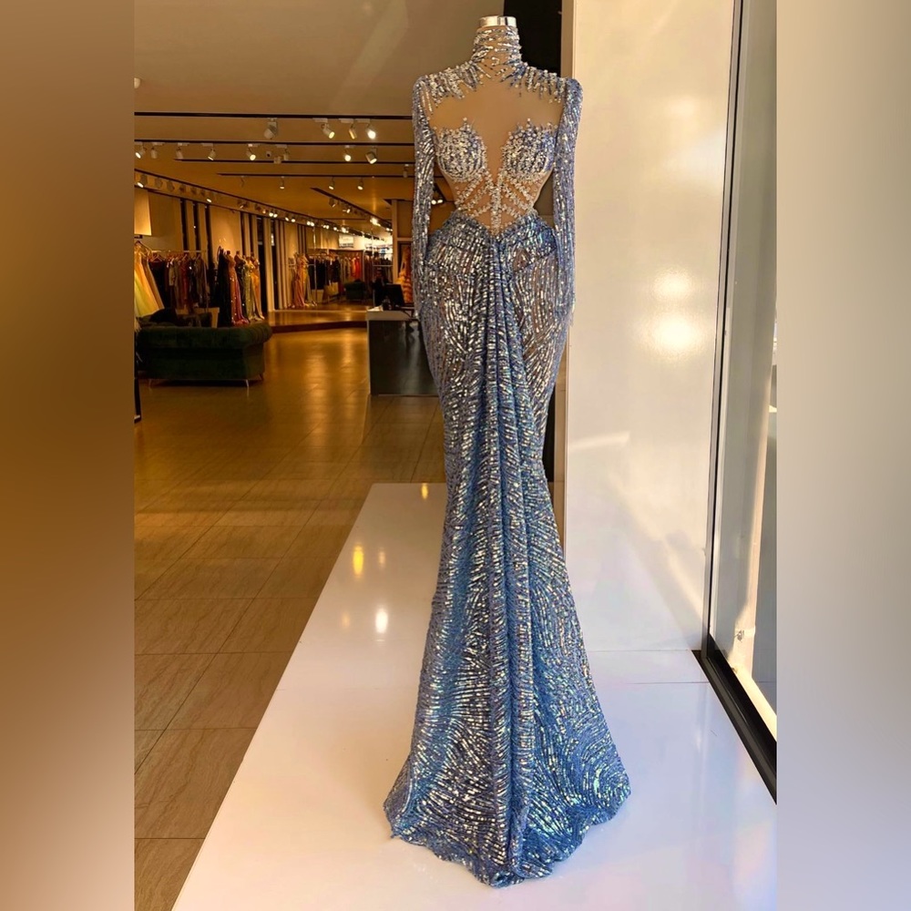 Bought for my 40th birthday but it arrived late. Never worn,still intact.